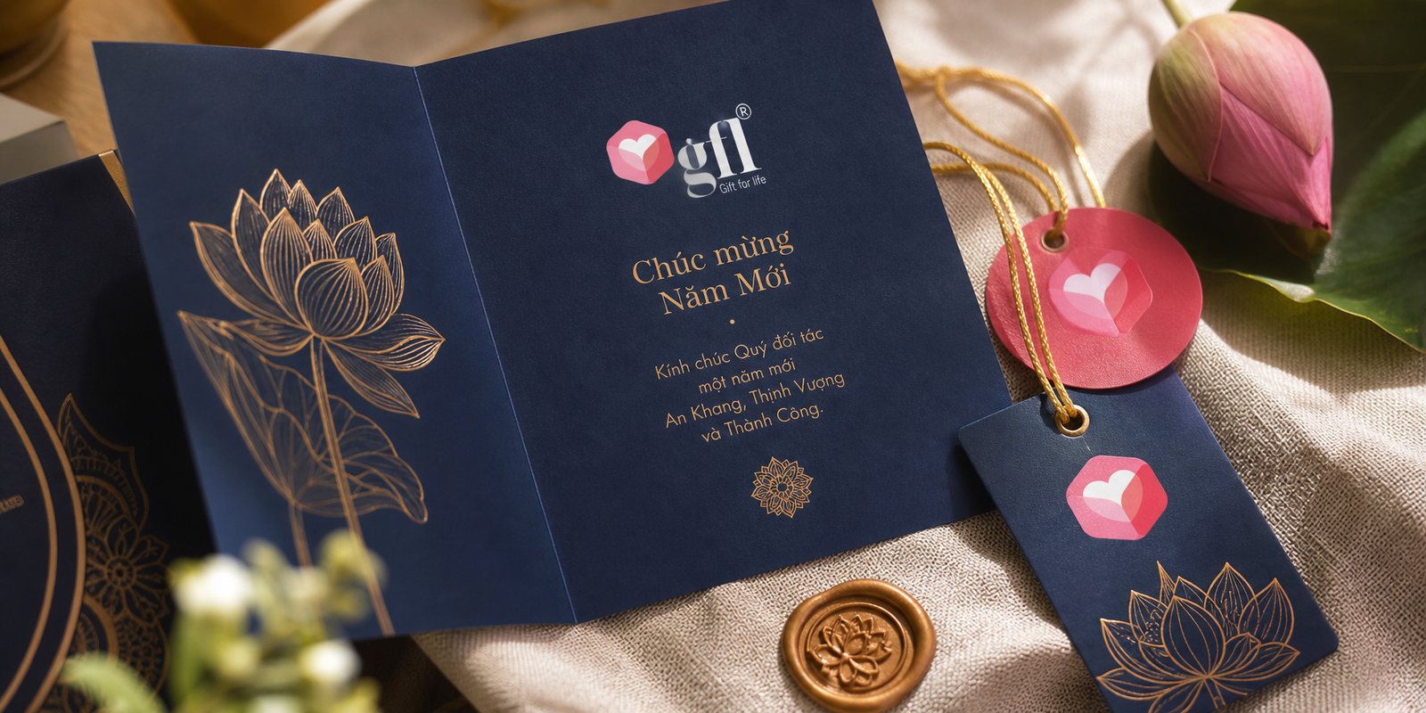 Greeting card and gift tag set bearing the heart mark, tied with gold cord