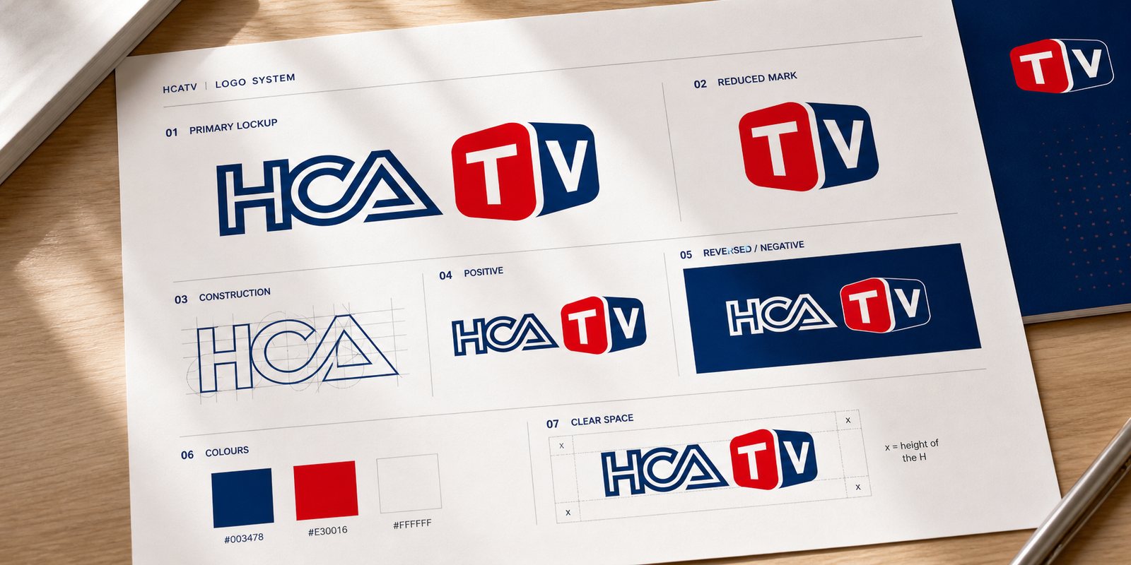 The HCATV logo system: full mark, negative, reduced screen block and colour palette