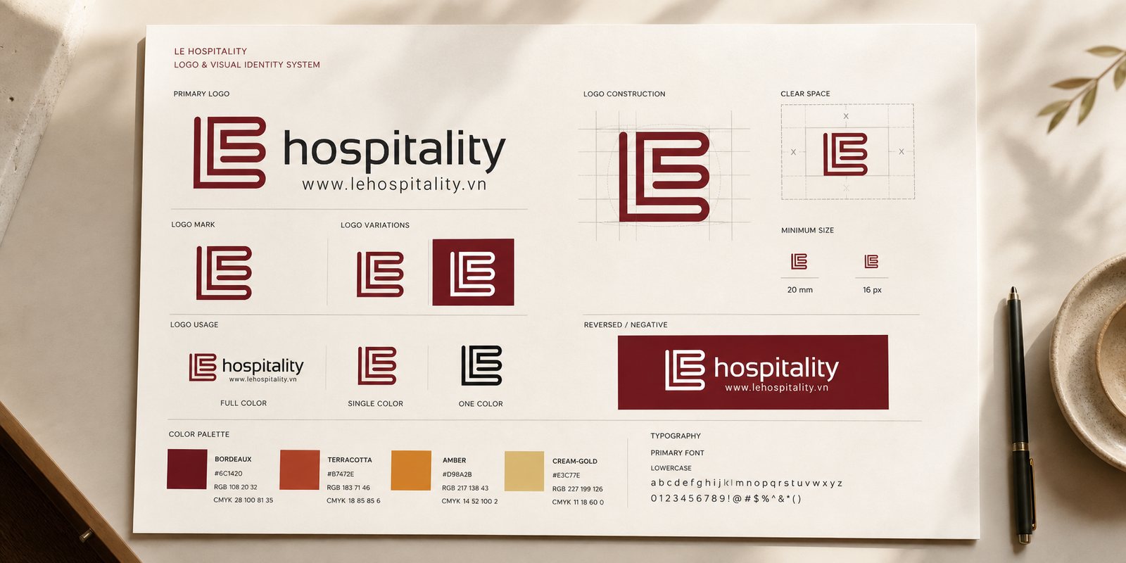 Bảng dựng monogram LE của LE Hospitality: cấu trúc lưới, bản dương và bản đảo màu