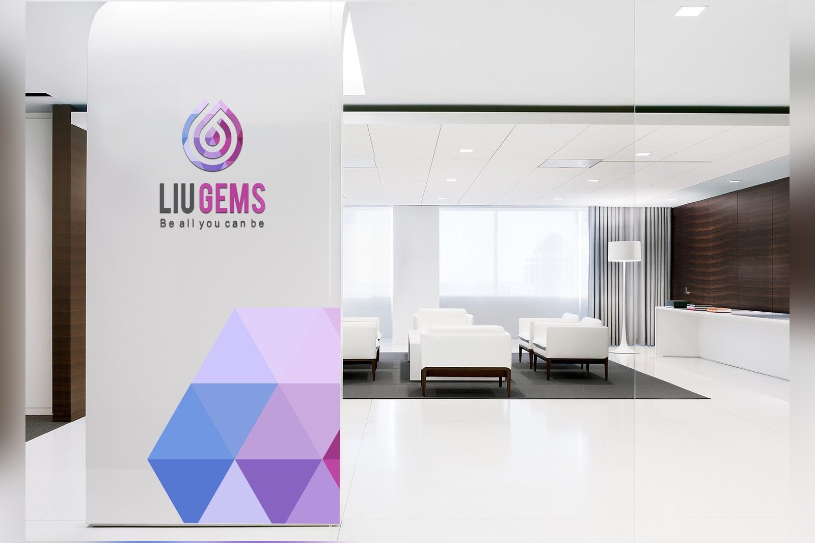 A LiuGems standee and wall panel in a lobby, the gradient hexagon pattern running down the standee