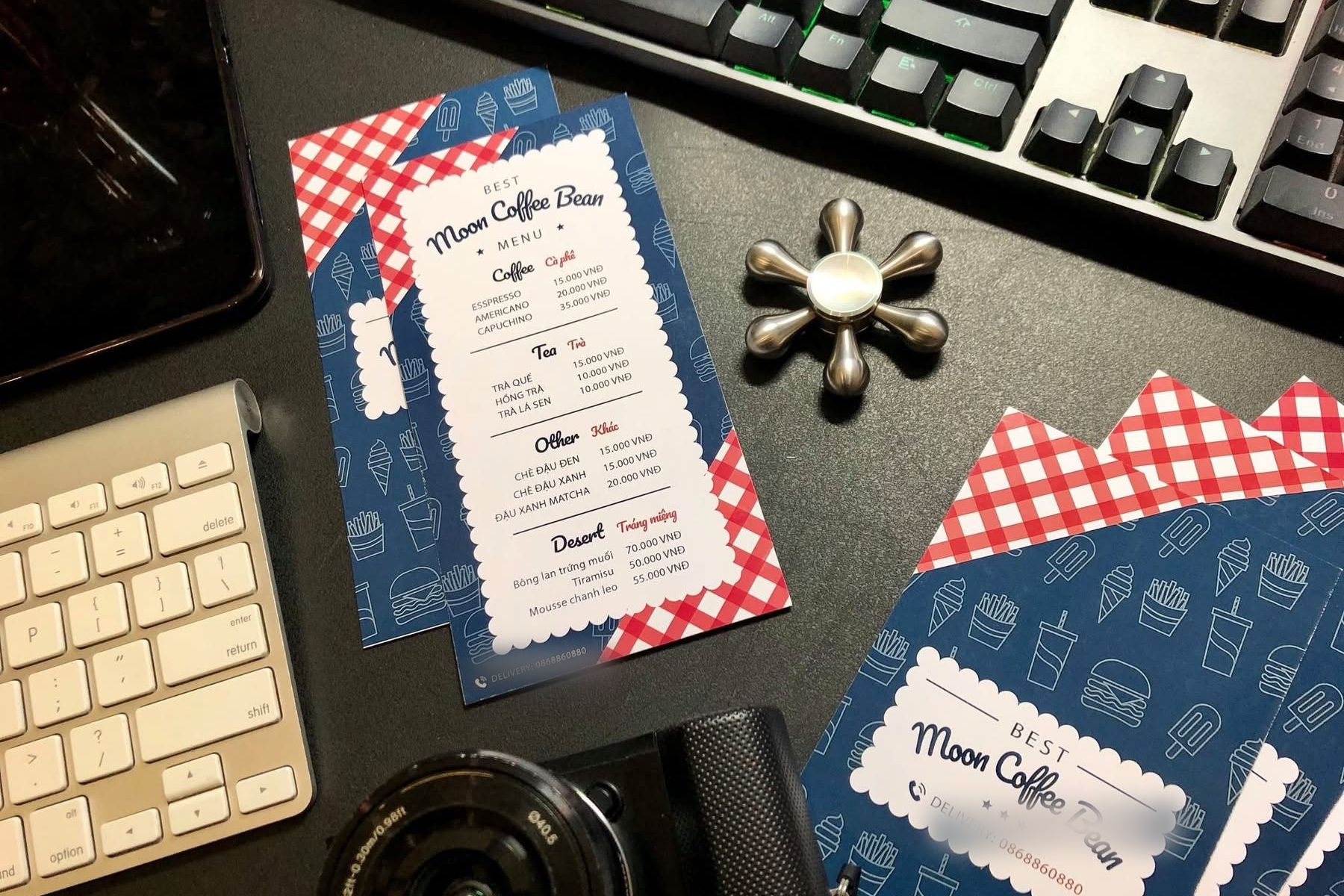 The Moon Coffee Bean menu card on navy with a red gingham border