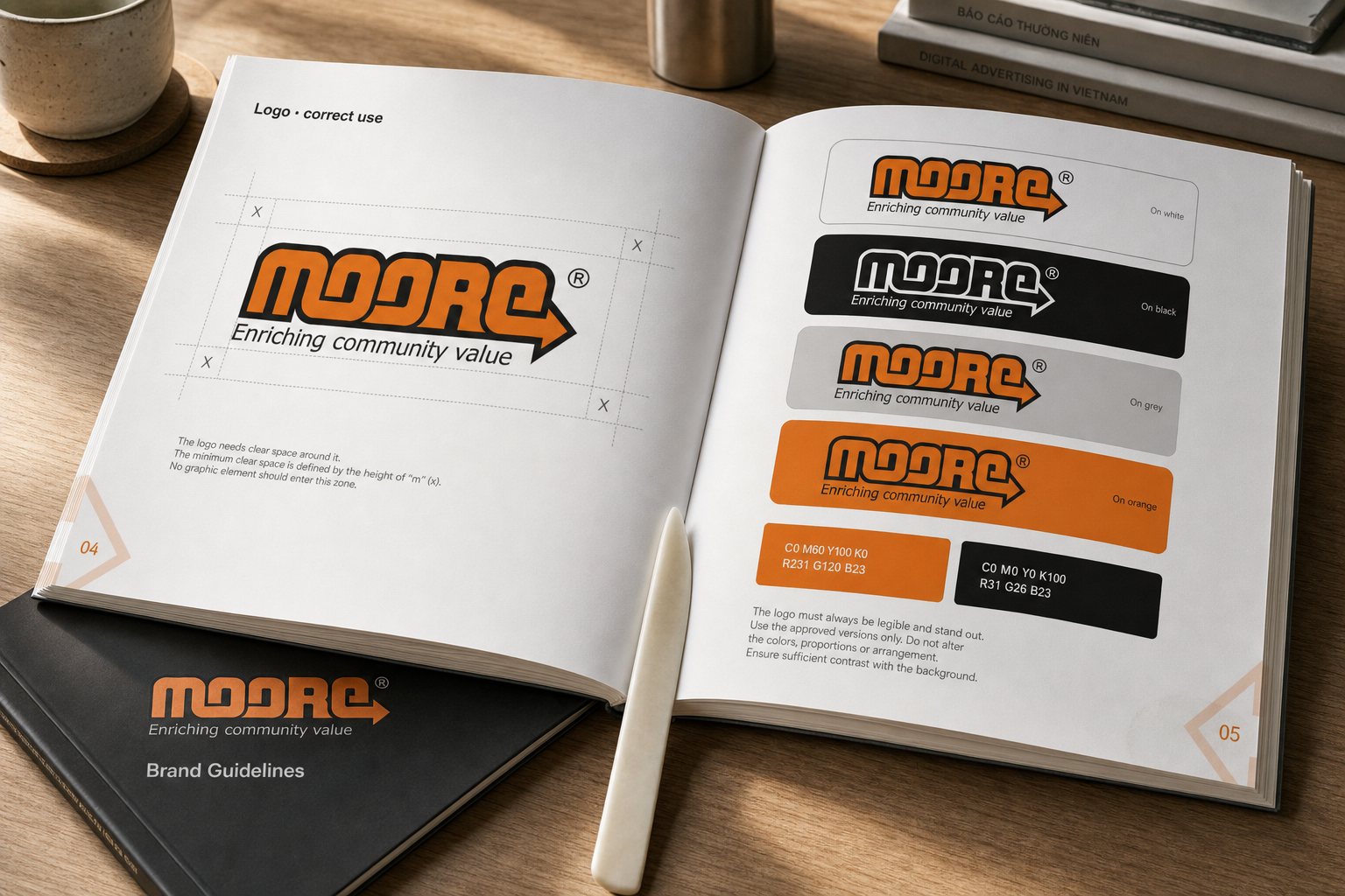 Moore guidelines open at the page showing logo versions on four different grounds and two brand colour blocks